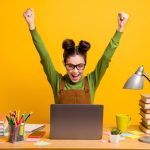 woman-yellow-office-victory
